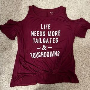Life needs more tailgates & touchdowns maroon cold shoulder t-shirt. Never worn.